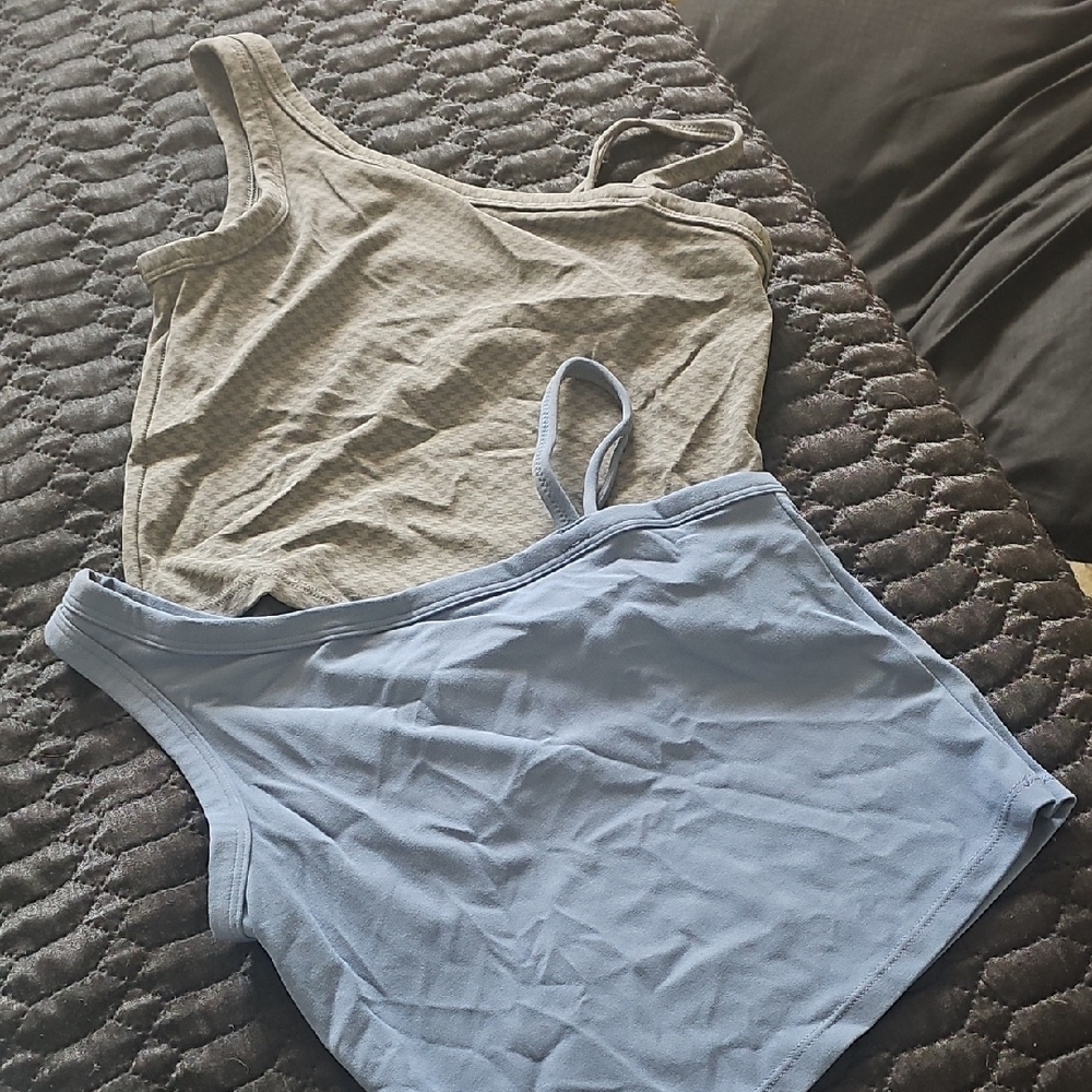 All in Motion Asymmetrical Cream and Blue Tank Tops